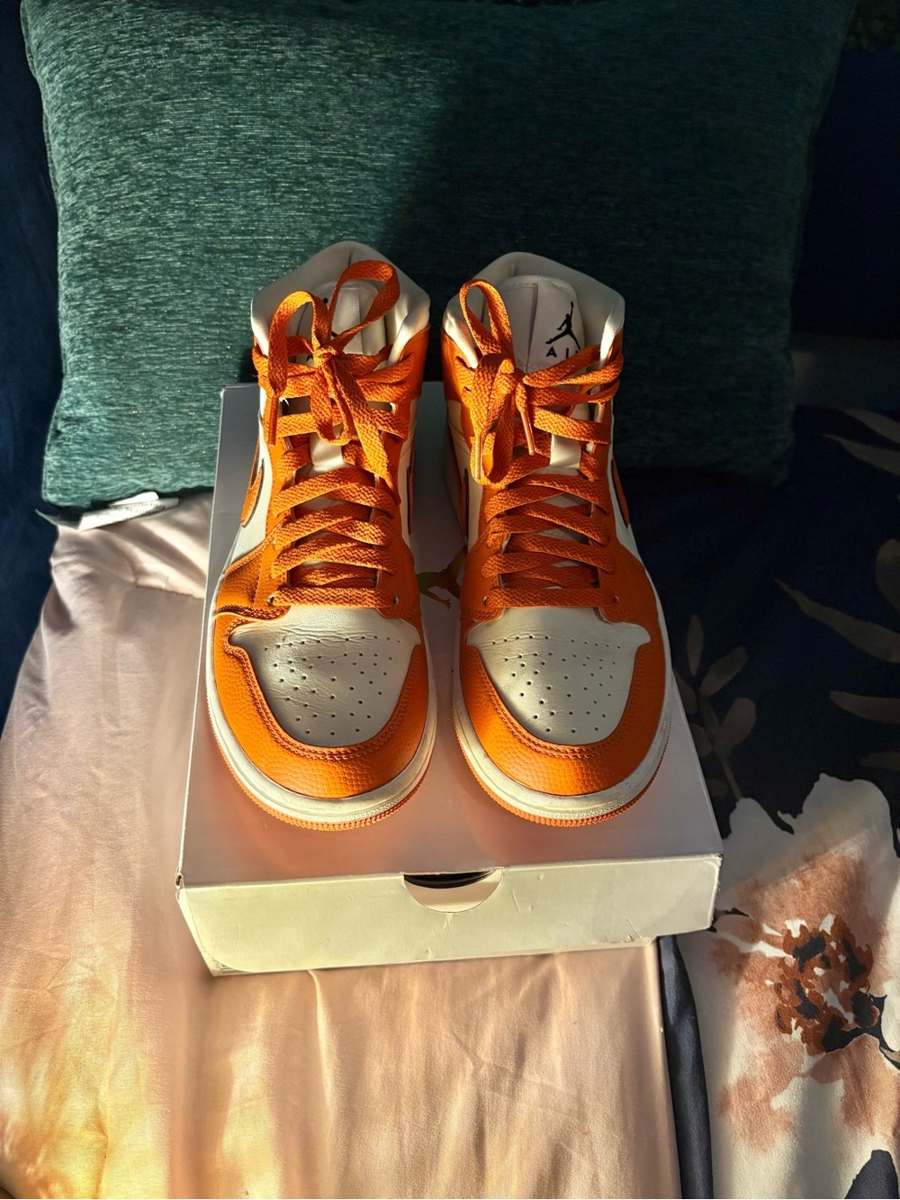 Jordan Women’s High-Top Sneakers in Orange and White